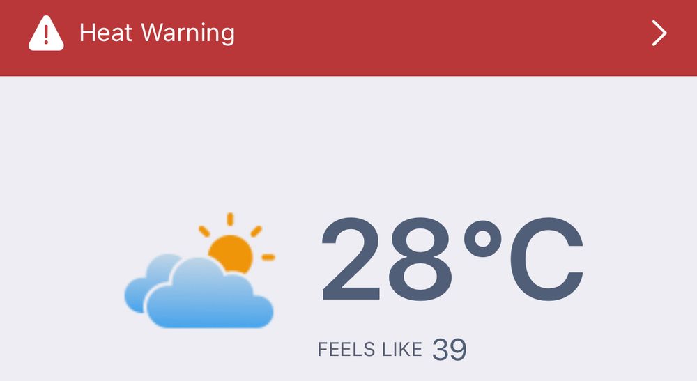 A screen shot of my weather app. It is 28 Celsius, but feels like 39 because of humidity at 10 am in the morning. Also there is a heat warning.