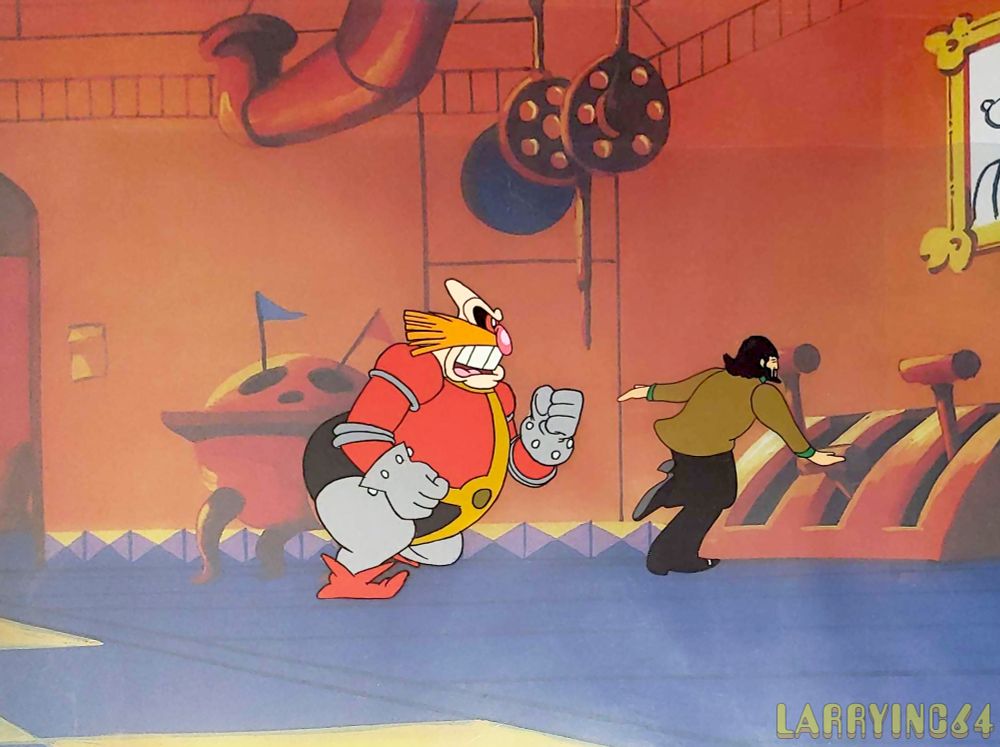 A cel of Dr. Robotnik from The Adventures Of Sonic the Hedgehog, displayed with a cel of George Harrison from Yellow Submarine. 