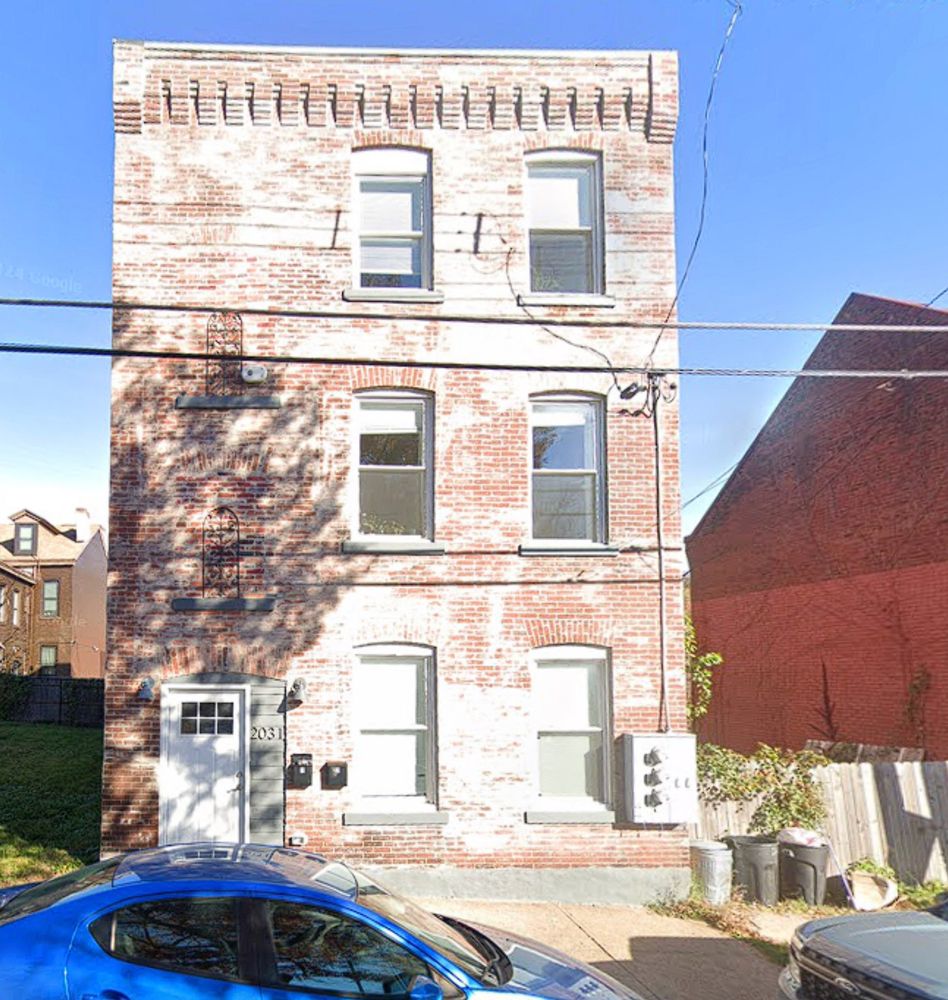 Photo of the restored house -- this is the work the Mayor has accomplished improving housing in Pittsburgh.