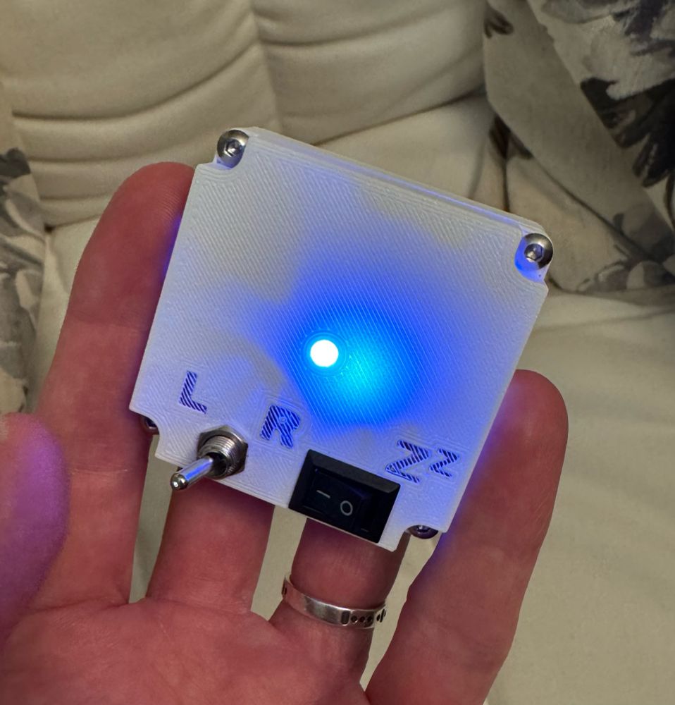 3D printed device with switches for baby breastfeeding tracking and nap tracking.
