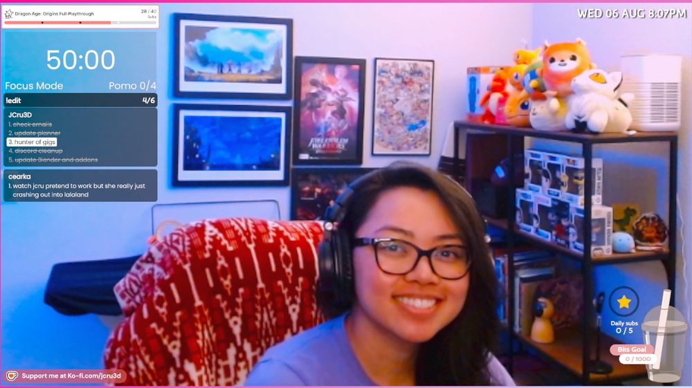 Tasklist to the left, artwork in the background, nerdy decor to the right and JCru in the center 
