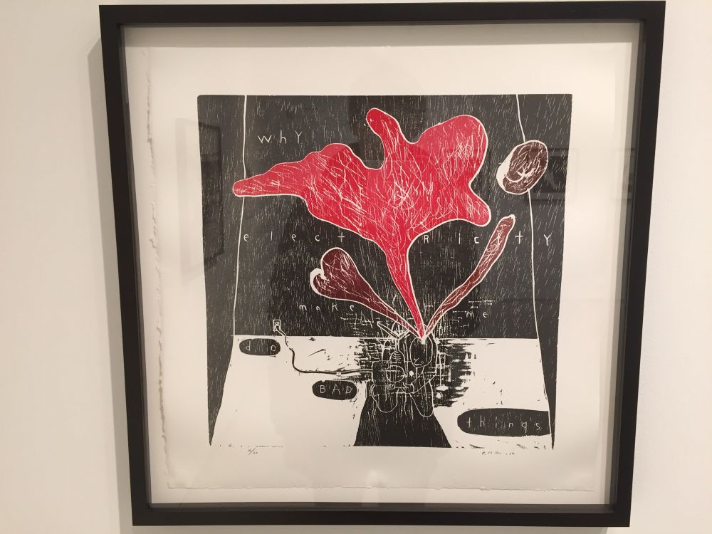 An artwork of… maybe a man crouched over with what might be a big red blood splatter spreading out from his head. Across the artwork, it says “why” “elect” “Ricity” “make” “me” “do” “BAD” “things”