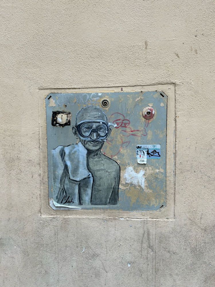 Gandhi avec masque de plongée. Collage.