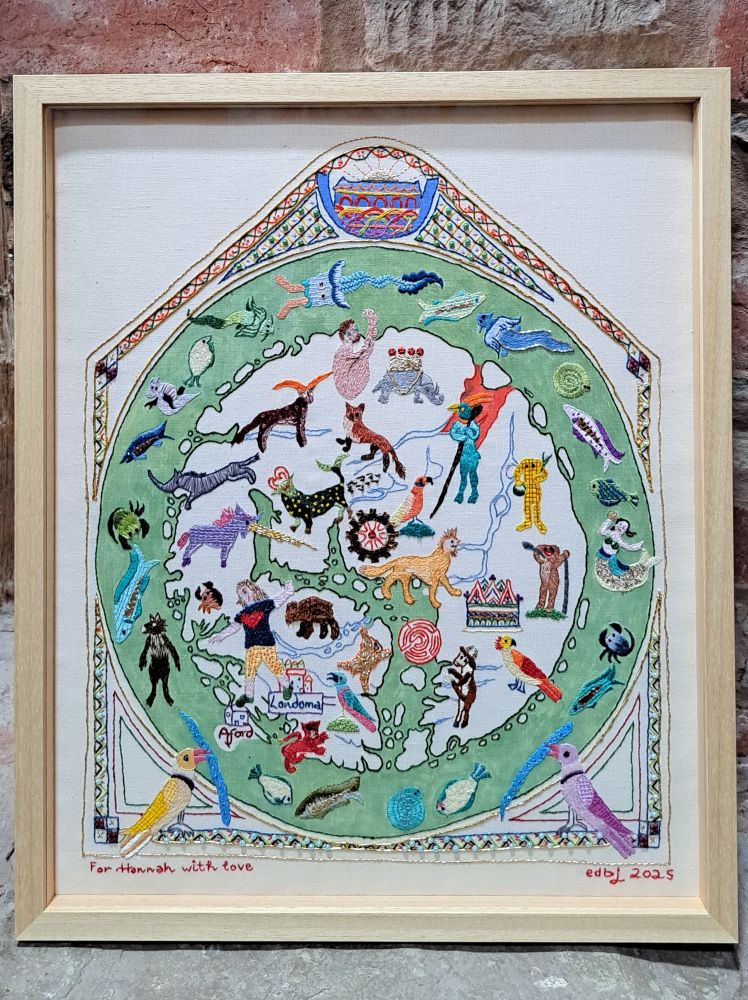 An embroidered version of the Hereford Mappa Mundi in colourful threads, beads and fabrics