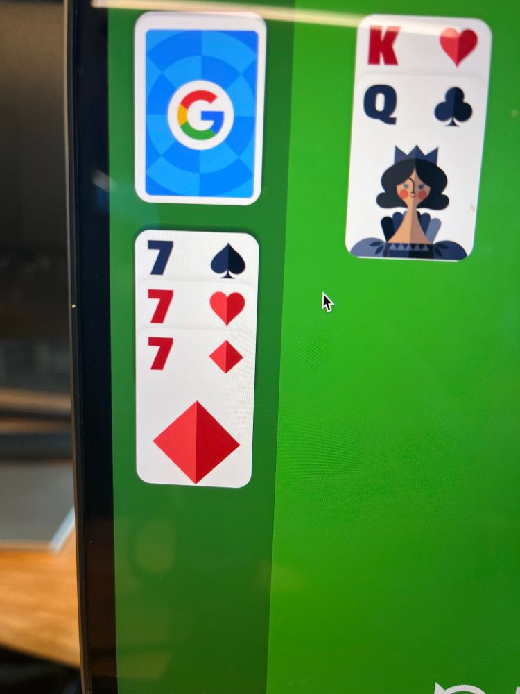 Three “7” cards drawn from the stock in solitaire 