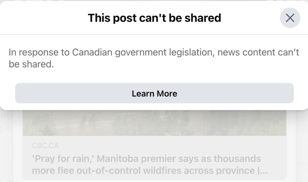 Photo from Facebook that says, "In response to Canadian government legislation, news content can't be shared." In the background, Marsha is attempting to share a CBC News story from May 30 about the fires. 