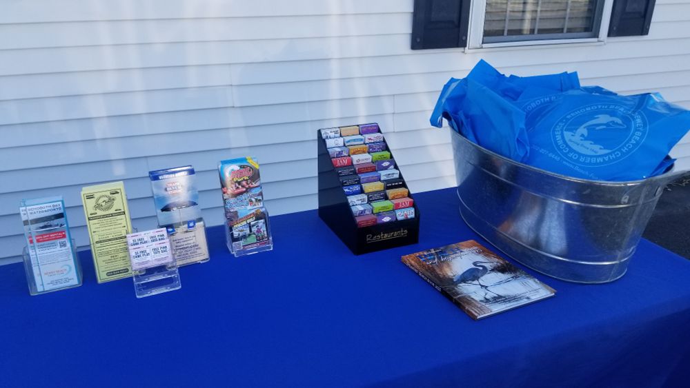 Real Estate Agency's table of promo stuff and pamphlets for folks stopping by to asses summer rental opportunities. (A year or 2 years in advance will secure the good spots. And the deposit is not cheap.)