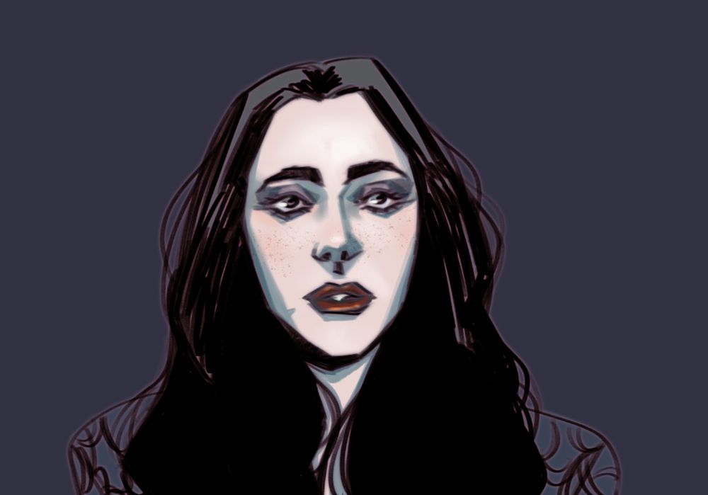 a pale woman with dark hair and angular features.