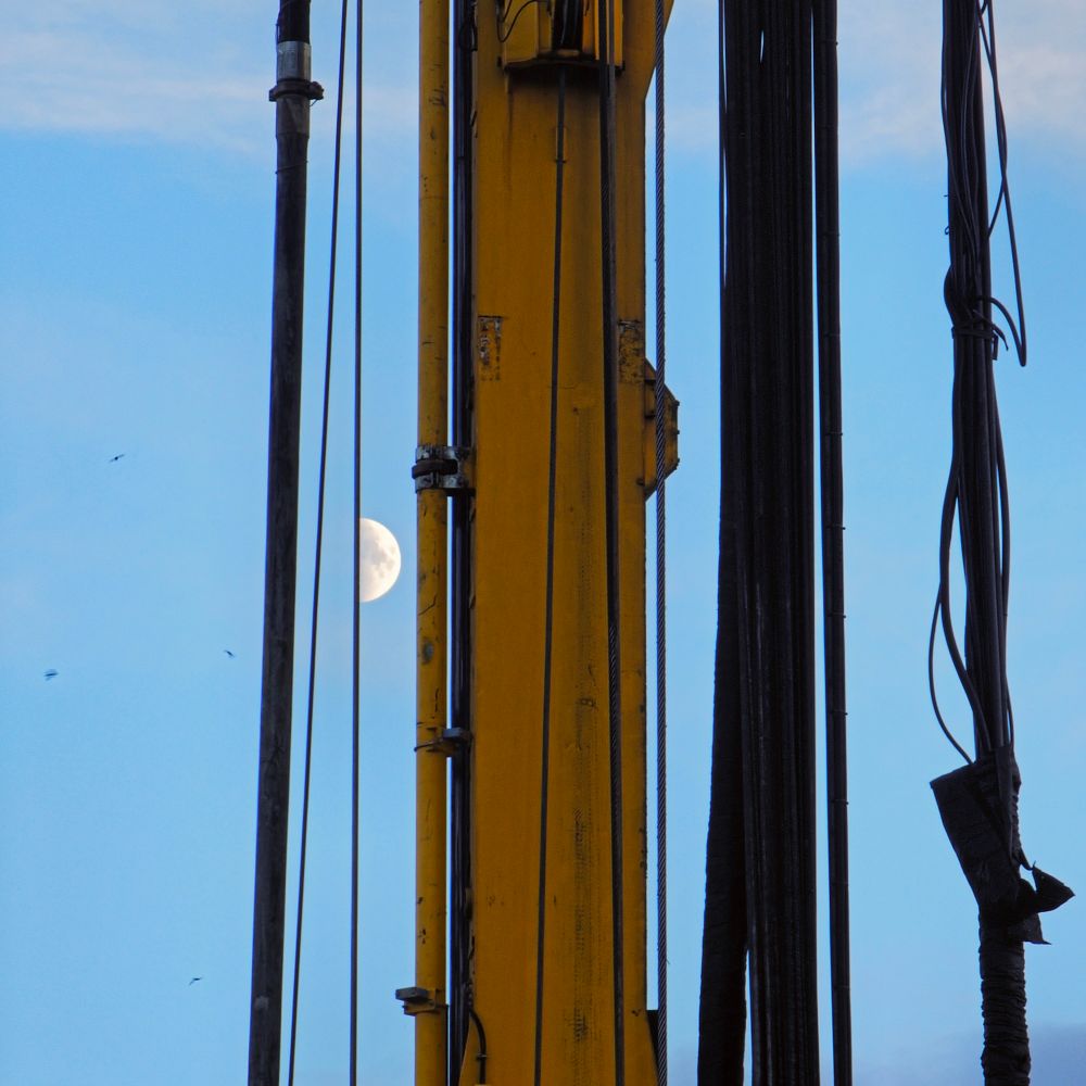 Half-Moon appears as if it's cut by cables dangling from a construction crane.