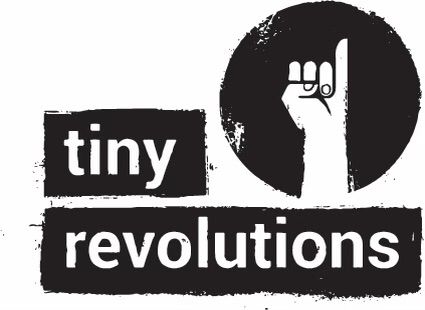 a black and white stencil style graphic with a clenched fist with little finger poking upwards. text underneath reading tiny revolutions 