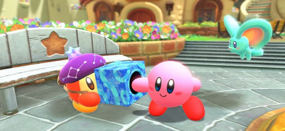 kirby reaching his hand into a blue box, held by waddle dee with a constellation hat