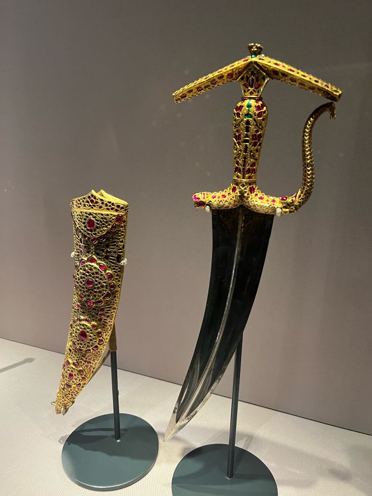 Ornately decorated dagger and sheath at the Great Mughals exhibition at the Victoria & Albert museum in London 