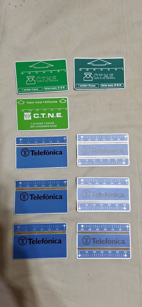 Anverso de 9 tarjetas telefónicasde banda óptica.