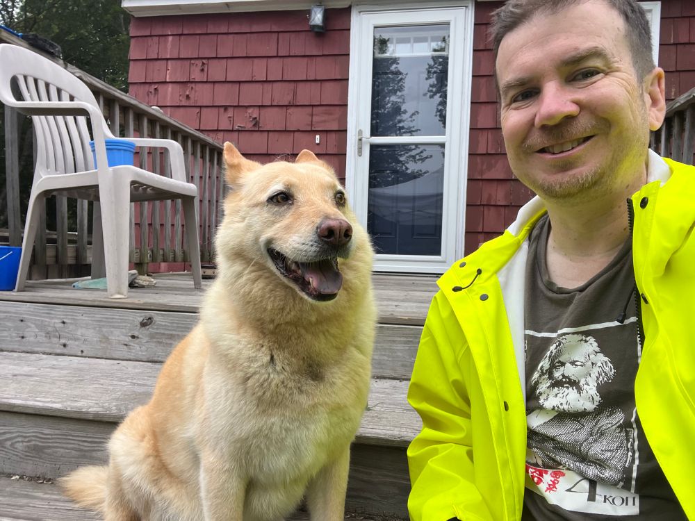 Bento (dog) smiling, Jason smiling