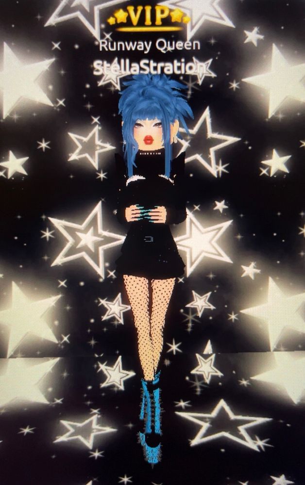 DTI photoshoot in edgy black and blue clubwear look with starry background