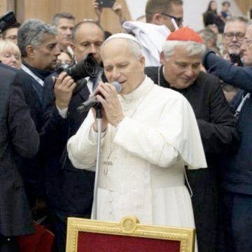 Pope Leo appears to be crooning into a microphone