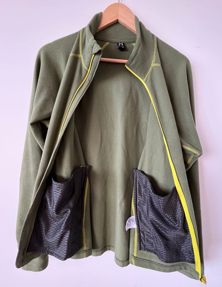 Haglöfs moss green zipped fleece jacket with lime detailing.