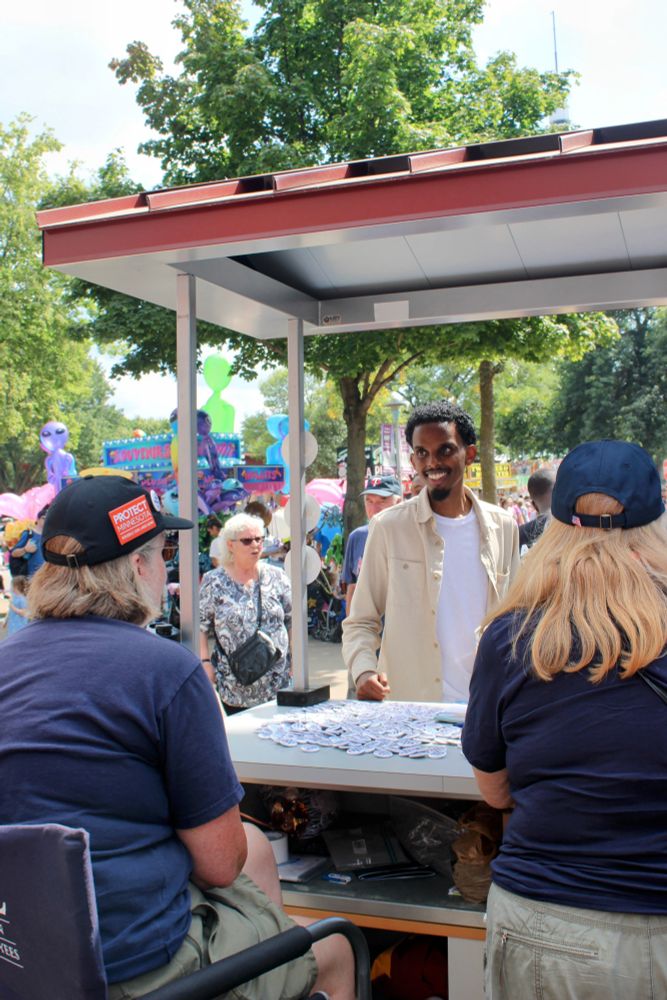 Omar Fateh visits the MAPE table at the Minnesota State Fair.