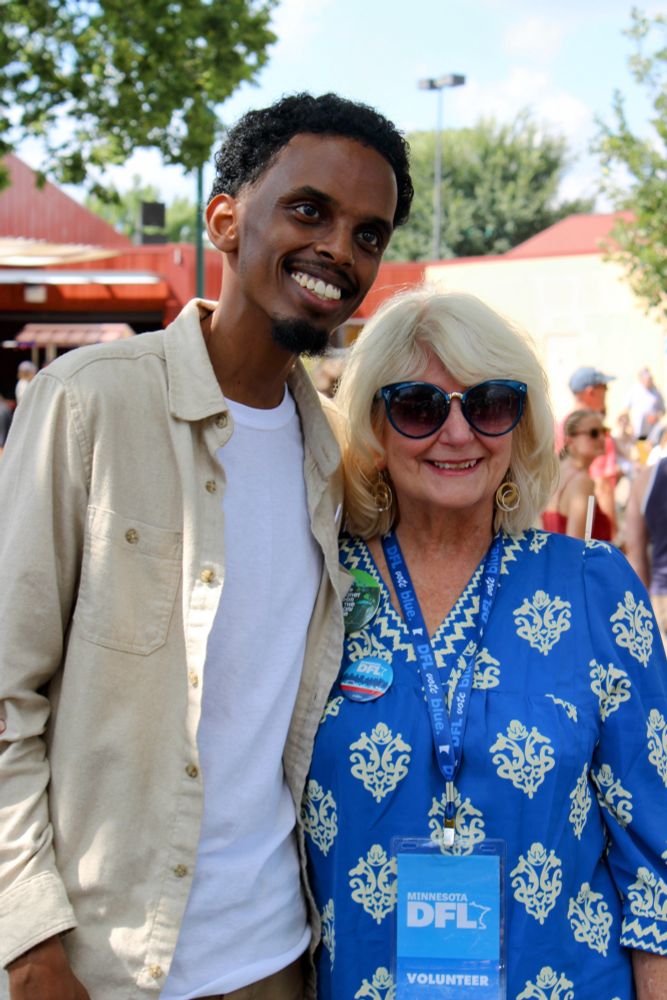 Omar Fateh poses with DFL volunteer.