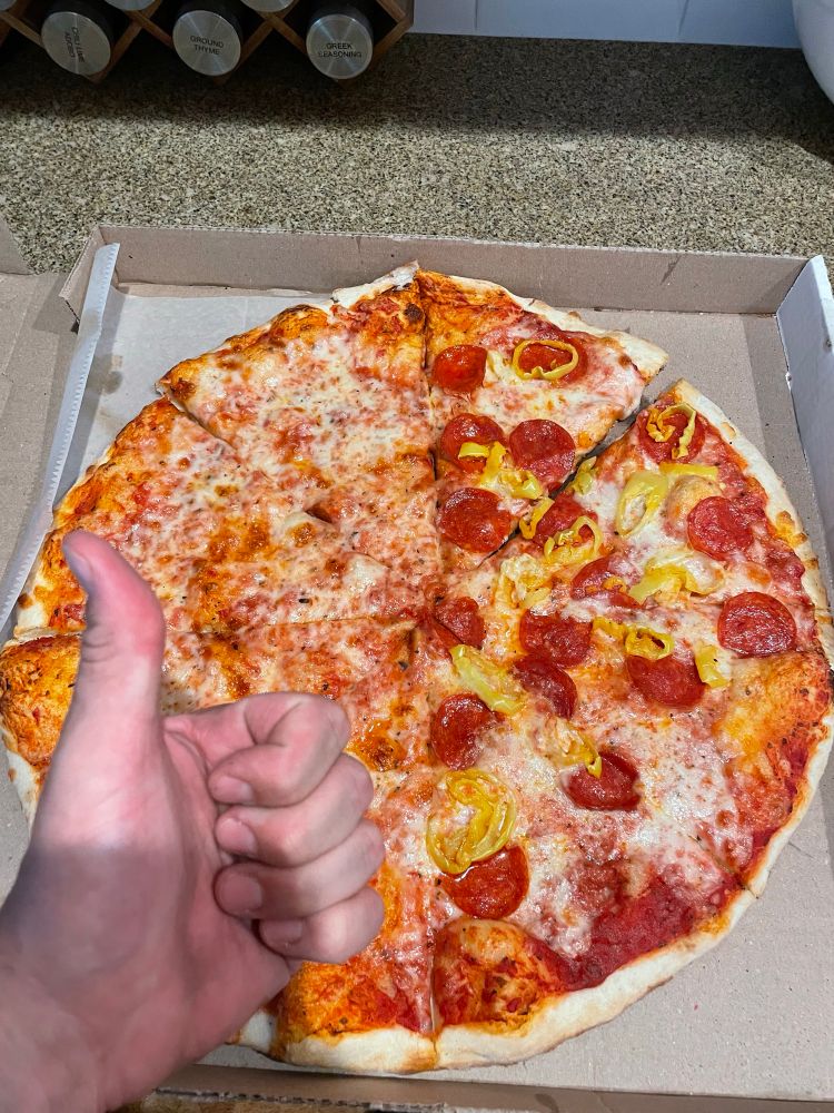 Pizza and a thumbs up!