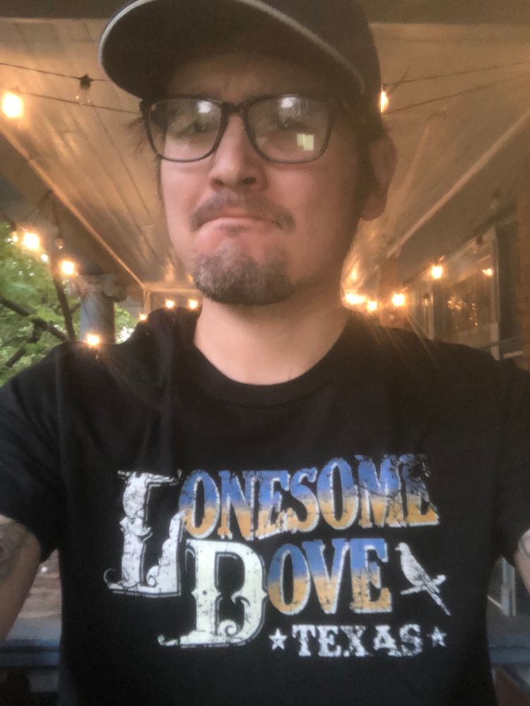 A 41 year of man in a lonesome dove t-shirt 
