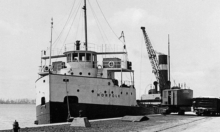 The SS Norfolk, owned by the Canada Steamship Lines, tied up at a pier circa 1930. Photographer unknown.
