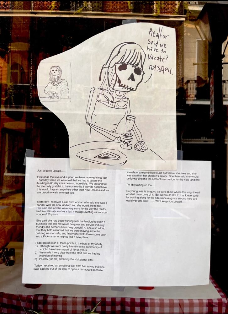 Hand drawing of a skeleton appearing to be that of a lady with hair & bangs seated at a table holding  a goblet, behind her, a picture on the wall also of a lady skeleton-likely Mona Lisa. 
Below, a typed brief six paragraph note describes the happenings of the last few days from the evicted restauranteur's perspective, including contact with the purported new building owner/partner who claims they're now backing out of the restaurant because people had found their address & were concerned for their family's safety.