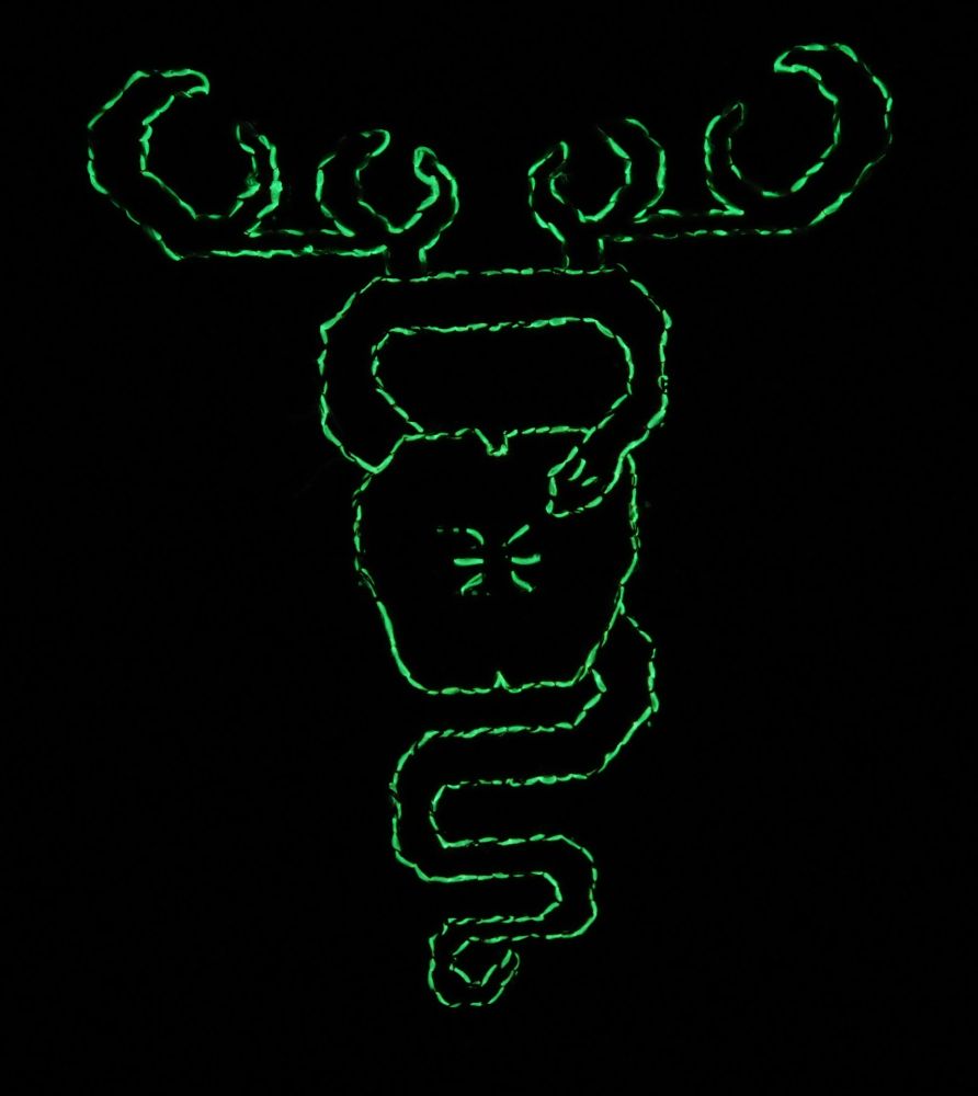 The same design as before, now in the dark to show the glow-in-the-dark back-stitching. 