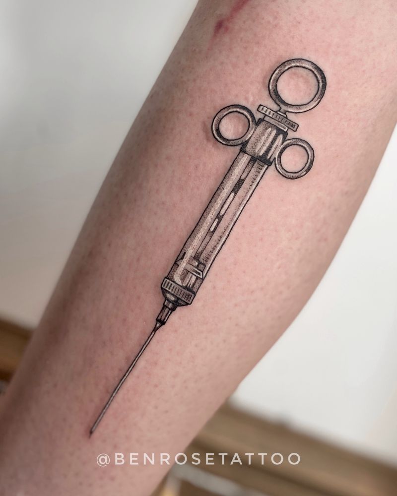 dotwork tattoo of an antique syringe 