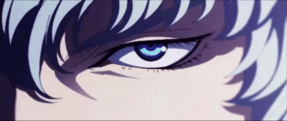 a close up of a person 's eye with a blue iris