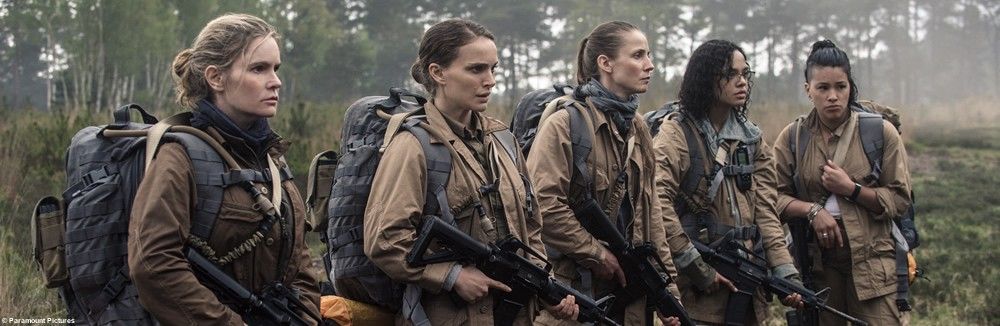 A still from the movie (or maybe a promo shot, idk). It shows 5 women wearing backpacks and what might be fatigues. 4 of them carry automatic rifles.