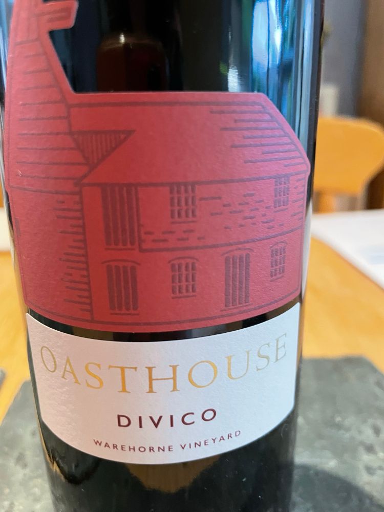 A wine bottle, labelled as described above. 