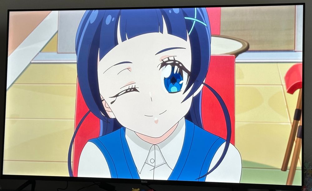 Nana winks and smiles