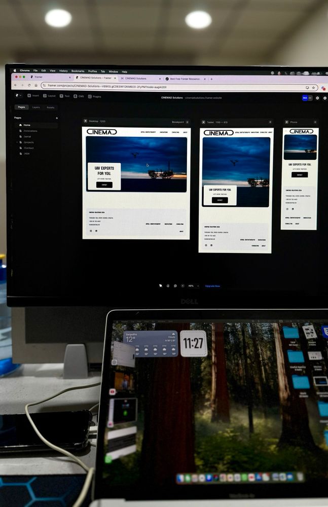 Picture of a Monitor showing Framer Designer Shammas working on a the UAV experts site on framer platform