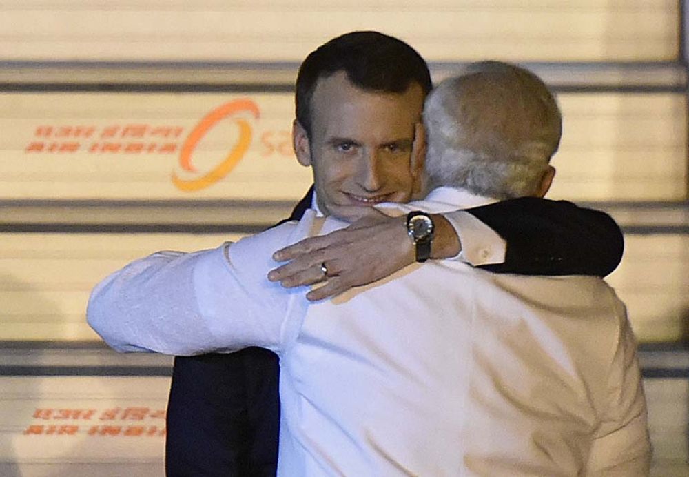 Macron hugging Modi