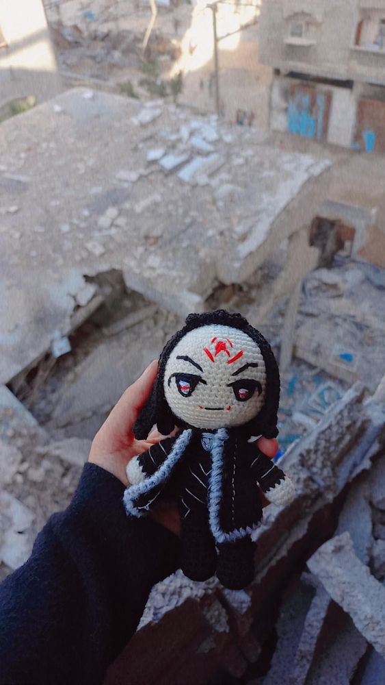 A photo of Zetian in the rubble of Gaza