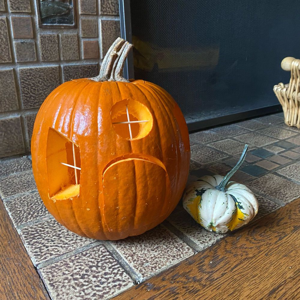 Pumpkin carved as a fairy house