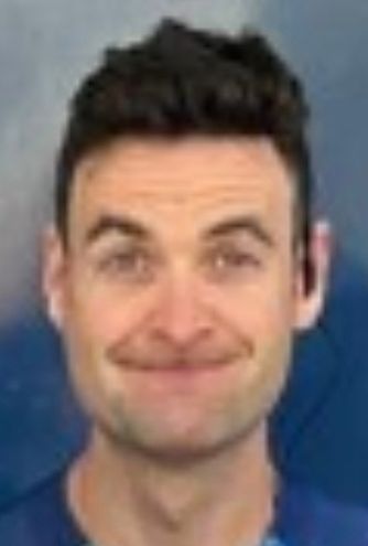 Guy next to Landa with a funny face