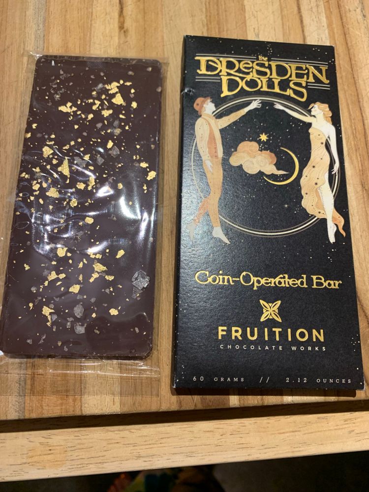 dark chocolate 🍫 bar with gold and sea salt
wrapper says coin operated bar by fruition chocolate works
gifted bc expired, but still tastes ok lol 😝 