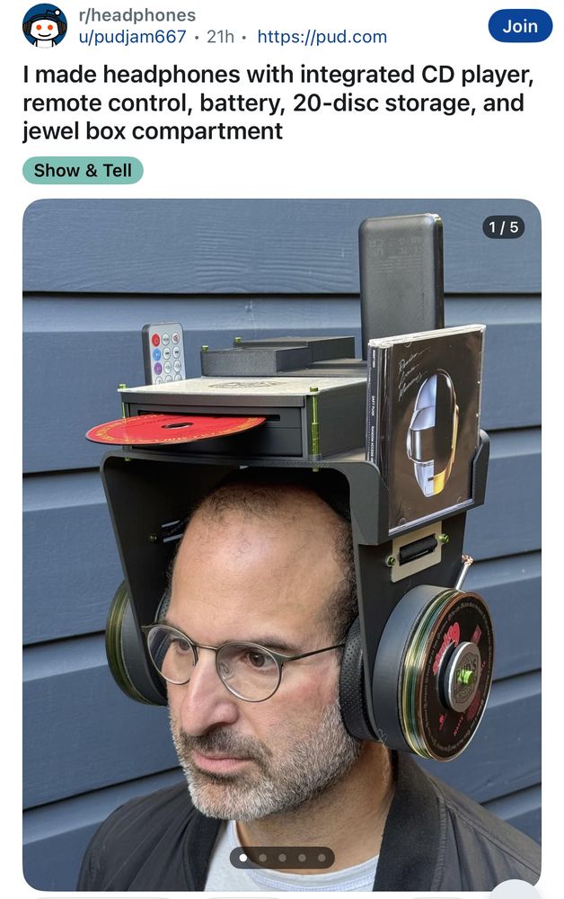 reddit post from philip kaplan titled “I made headphones with integrated CD player, remote control, battery, 20-disc storage, and jewel box compartment”

attached photos show him wearing the contraption