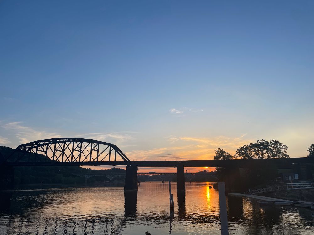 Sunset view of the river and Brilliant bridge from the Allegheny Rivertrail pier 
