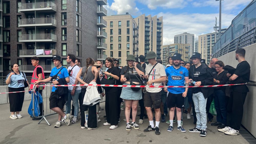 People queuing for standing at tonight’s oasis concert at Wembley stadium. 