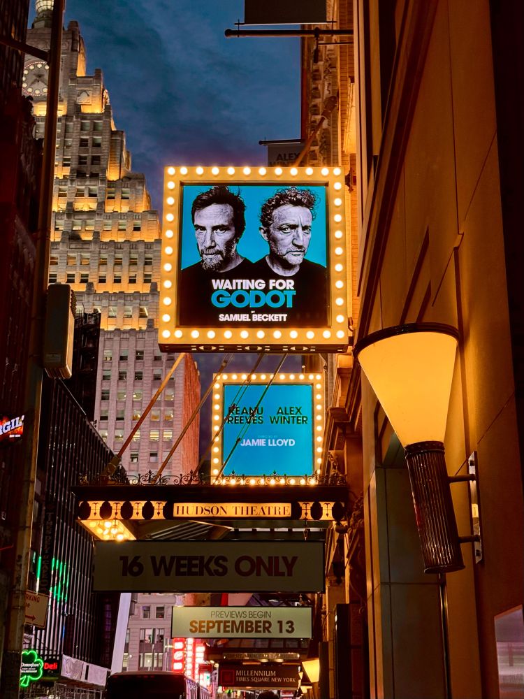 Waiting For Godot sign in lights on Broadway with Keanu Reeves and Alex Winter at the Hudson Theatre.