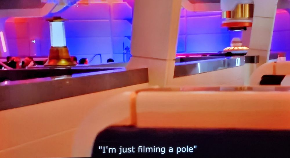Picture of a pole, caption reads, "I'm just filming a pole"