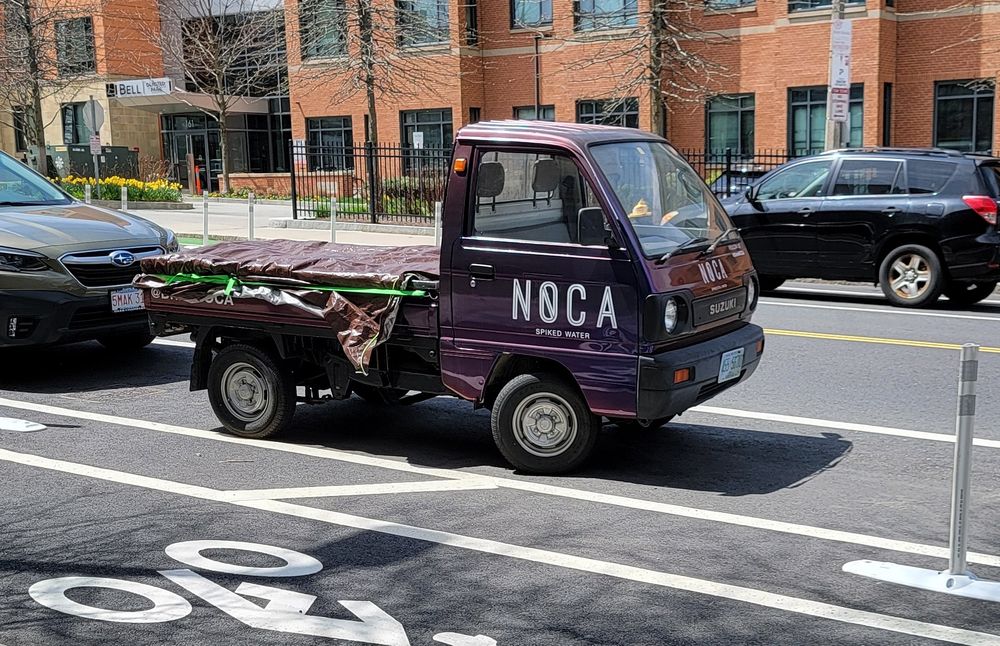 Cute little nugget, purple Suzuki tiny truck used by the Noca spiked water company. There's another one like this by the arboretum with cool wheels I've been meaning to get a picture of.