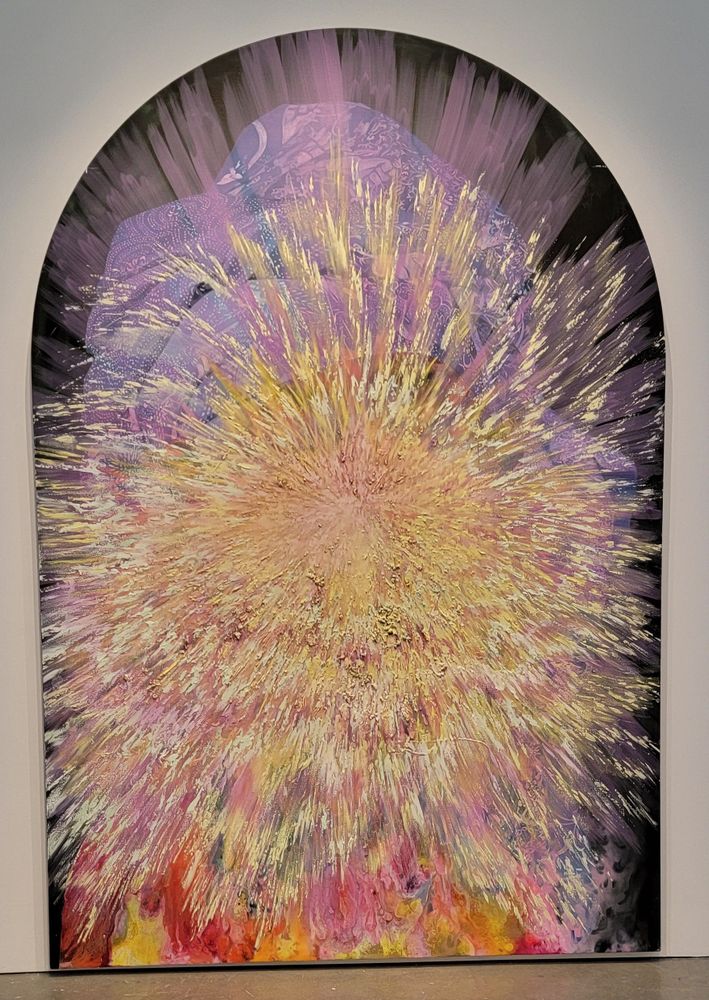 Firelei Báez - Madeleine (rupture rapture maroonage) An arched doorway into another world, a figure in the center with an indigo headdress adorned with elaborate designs indicative of the black liberation movements and practices