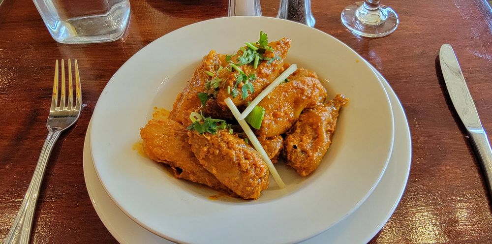 Tandoori momo Nepalese dumplings from Momo Masala. These are delicious and combine several of my most favorite things. Toasted in Himalayan spices and masala, delightful.