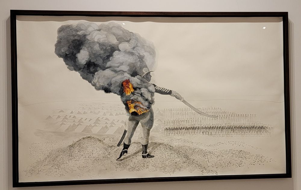 Firelei Báez - A motor with medicinal functions. A regimented man stands on a hill with his sword held out to beckon the army waiting in lines below him. His torso broken out in fire, belching smoke