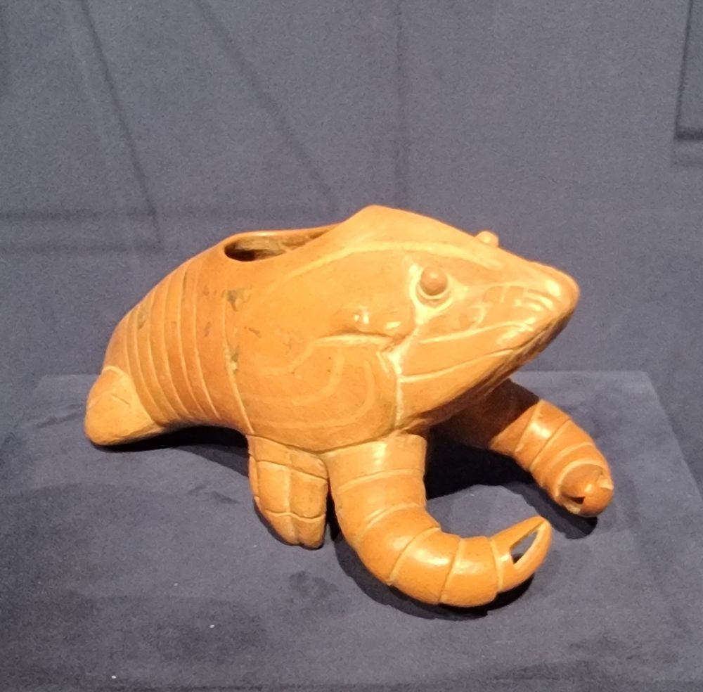 Lobster effigy vessel - Moche, phase II - IV, AD 200-600 earthenware with slip paint. Fluffy looking little guy.