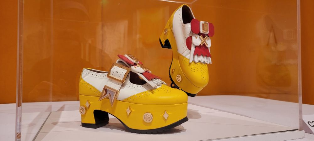 Minju Kim, Pair of shoes, 2013. Museum of Fine Arts Boston. An ornately decorated pair of shoes with a yellow lower, white leather top. Red and gold details. I thought these were pretty neat.